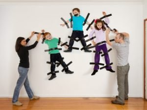 Children taped to wall